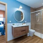 Apartment Atico Cholas By The