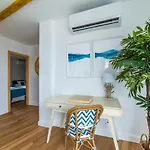 Apartment Atico Cholas By The